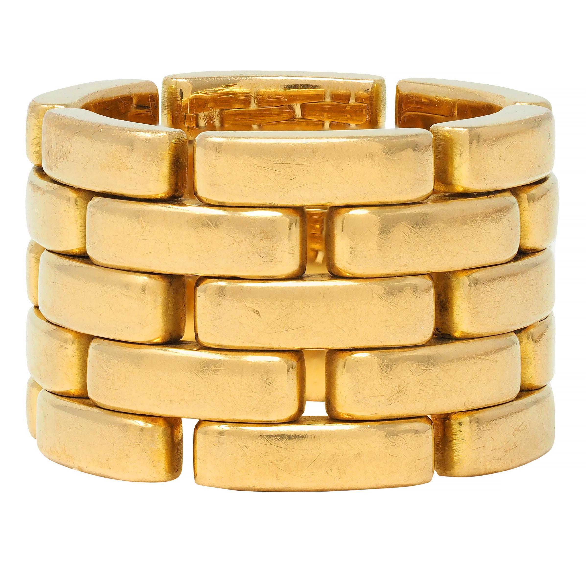 Comprised of five rows of panthére style links 
Meshed fully around with some flexibility
Completed by high polish finish
Stamped with French hallmarks for 18 karat gold
Numbered and fully signed with maker's mark for Cartier
Circa: 2000s; from the