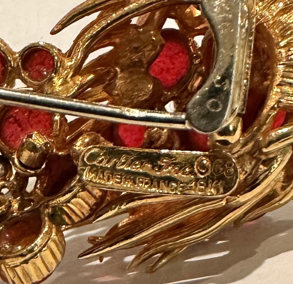 Mid-Century Modern Cartier France 1960s Yellow Gold Diamond And Red Cabochon Stone Lion Brooch For Sale