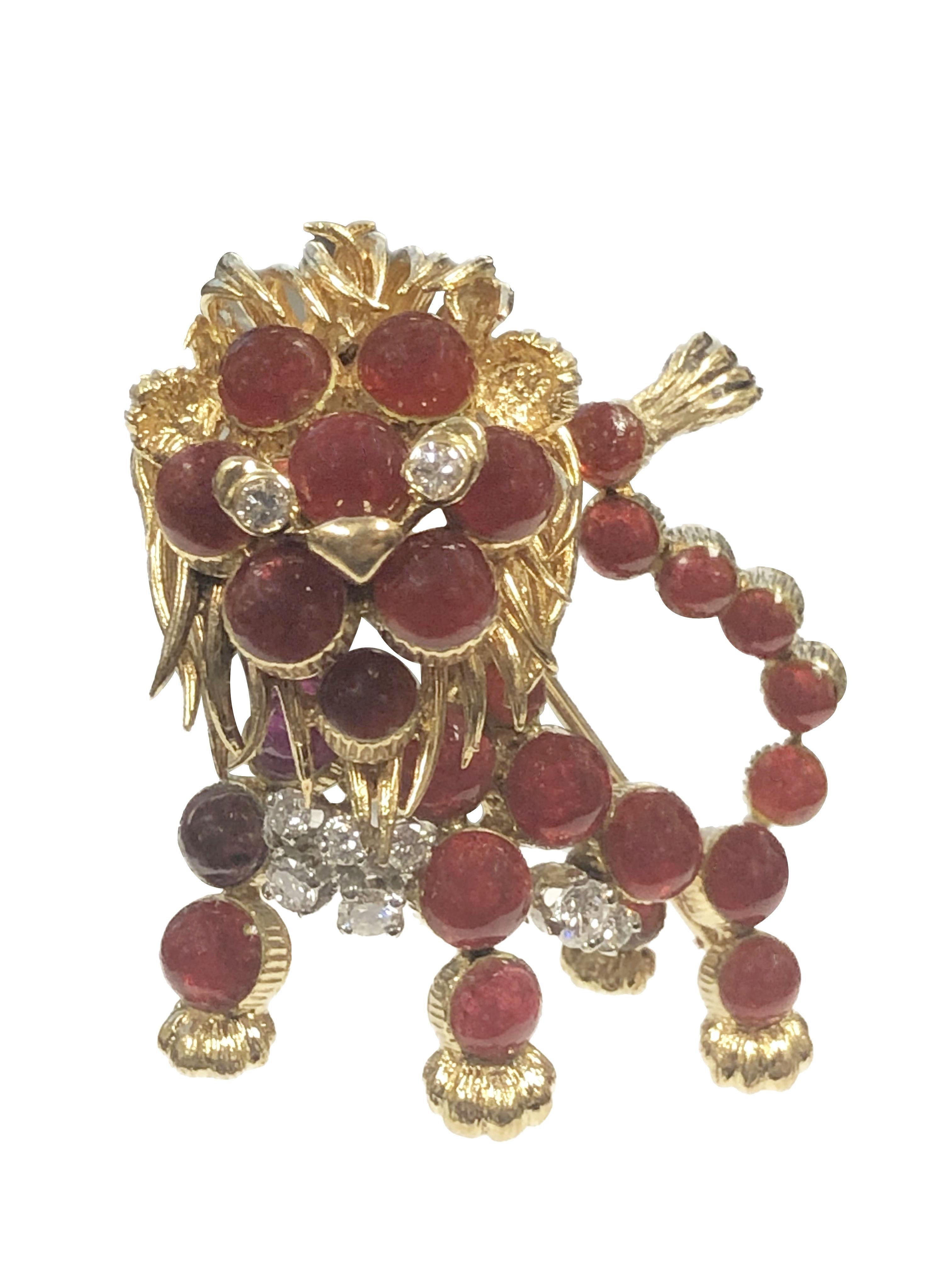 Round Cut Cartier France 1960s Yellow Gold Diamond and Red Cabochon Stone Lion Brooch For Sale