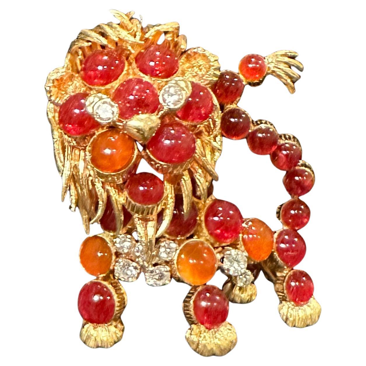 Cartier France 1960s Yellow Gold Diamond And Red Cabochon Stone Lion Brooch