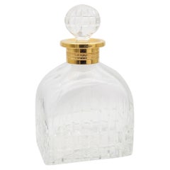CARTIER Francia 1980 Bottiglia da liquore in cristallo tagliato a mano con collare d'oro dorato