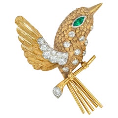 Cartier, France Mid-Century Gold and Gem-Set Hummingbird Brooch