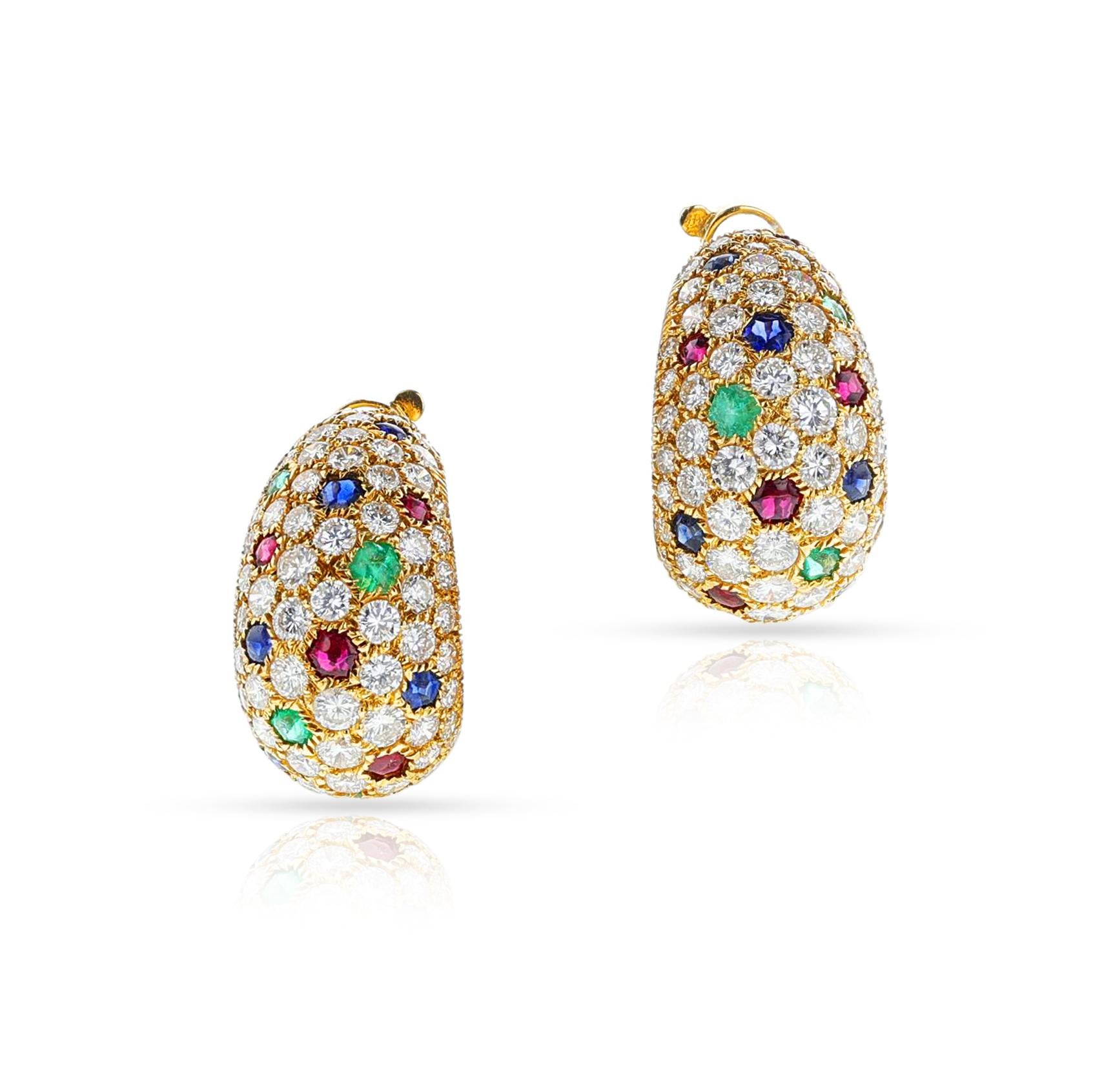 A pair of Cartier France Ruby, Emerald, Sapphire and Diamond Gem-Set Earrings made in 18k Yellow Gold. The design is of a half-hoop, pavé set. The diamonds weigh appx. 7.25 carats, appx. E-G color and VVS-VS clarity. The length is ¾ inches. Signed