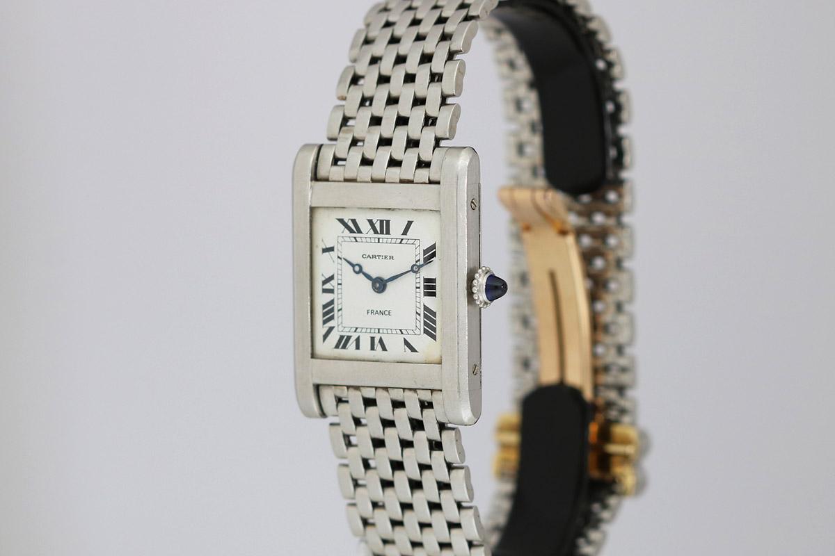 This is a super rare Cartier France Tank Normale in platinum from the 1940s. The condition of this watch is excellent considering its age. The original cream dial has black roman numbers and its original blue steel hands. This special watch comes on