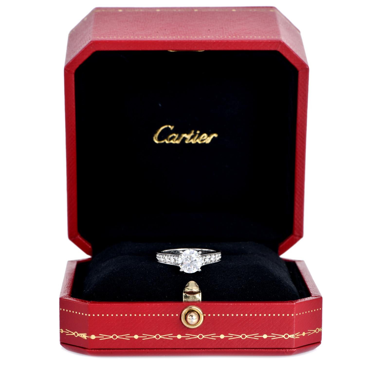 This timeless classic Cartier Engagement ring is crafted in Platinum.

This Cartier diamond solitaire ring is from the 1895 collection. centered by a  1.12-carat round brilliant diamond,  F-G color VS1 Clarity. prong-set the shoulders of the band