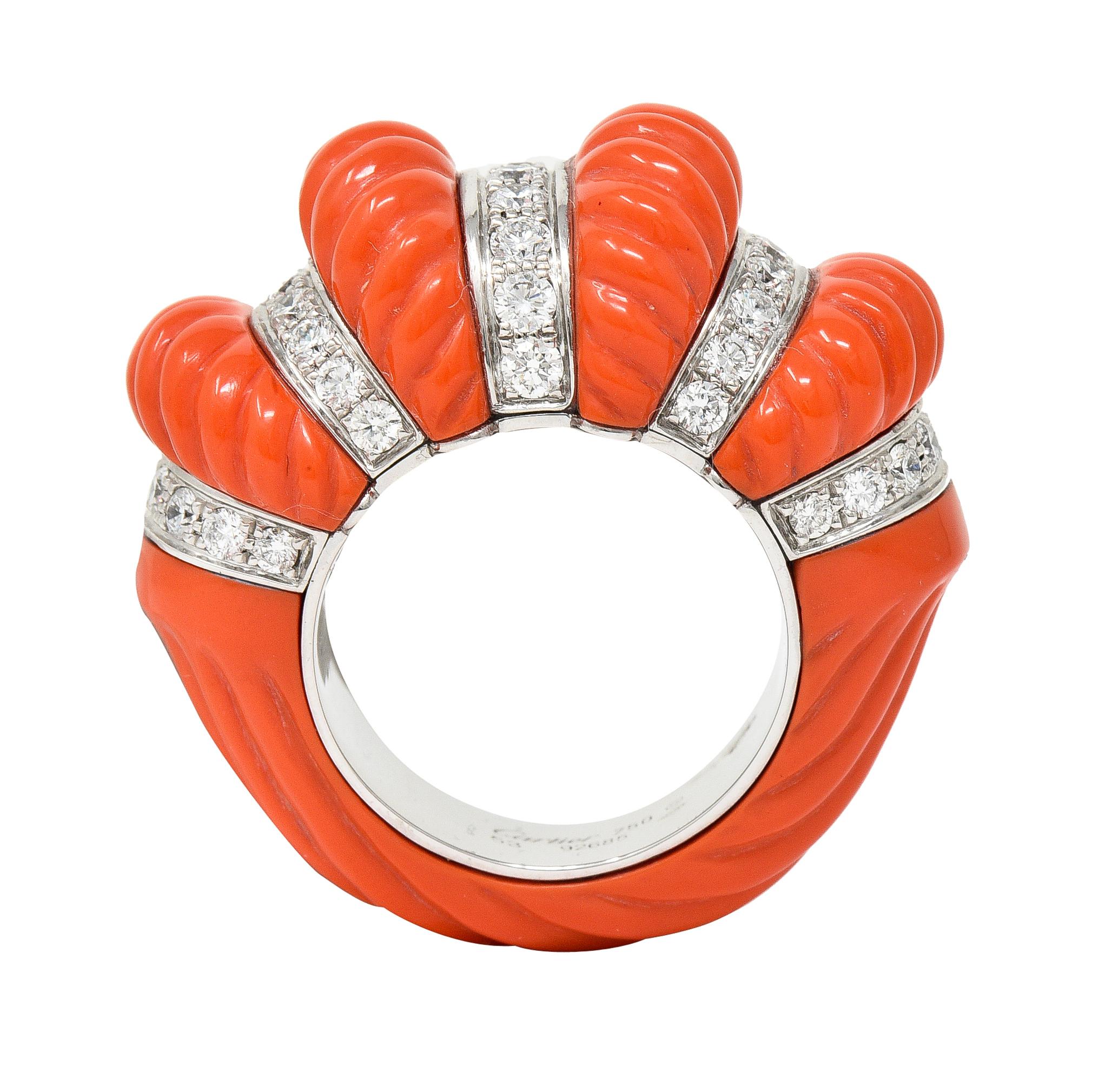 Designed as a domed form comprised of alternating segments of coral and round brilliant cut diamonds 
Coral is carved with fluted pattern - opaque medium reddish-orange in color
Diamonds are bead set in rows and weigh approximately 1.93 carats
