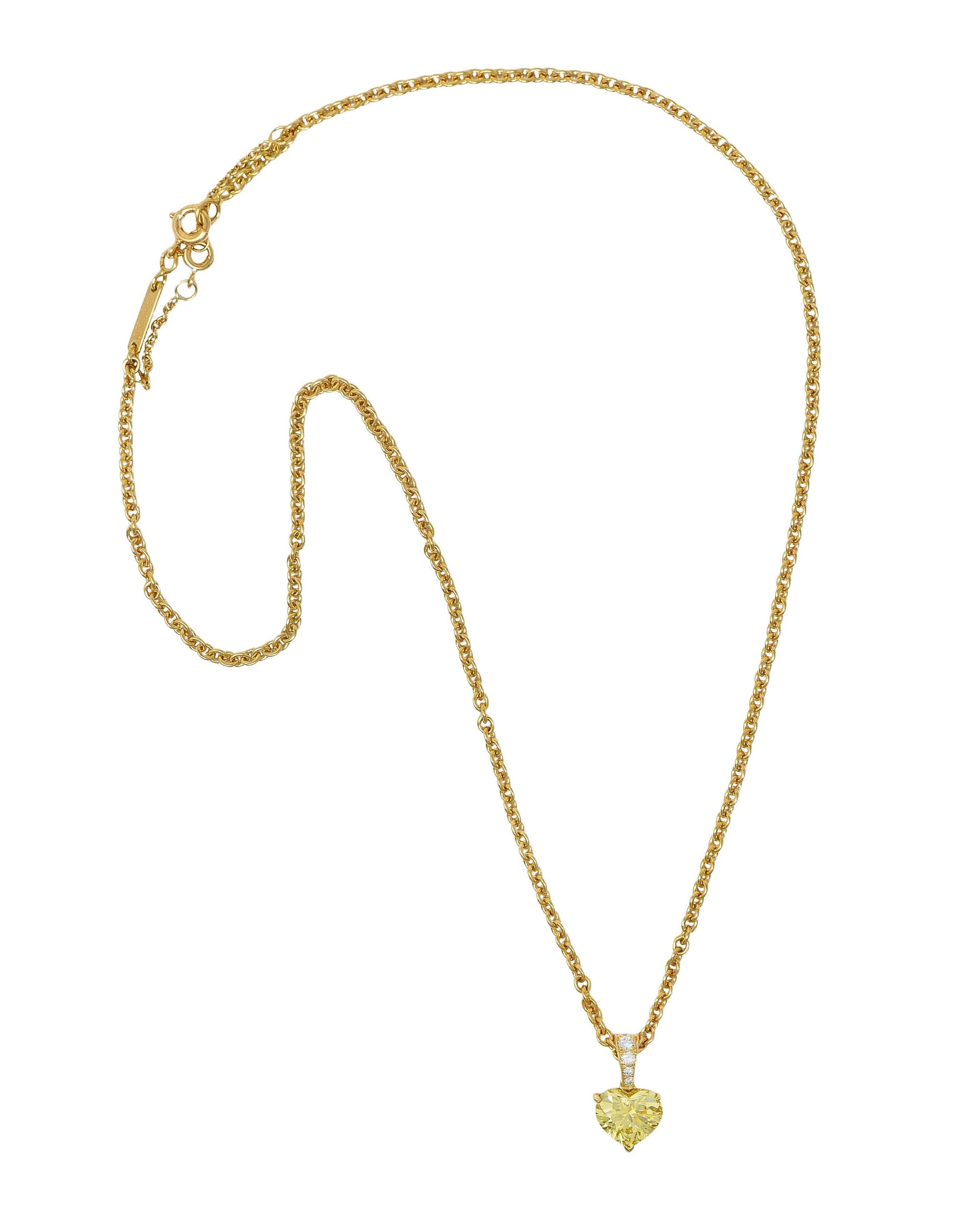 Comprised of 2.0 mm cable link chain suspending a heart-shaped pendant 
Centering a prong set heart cut diamond weighing 2.13 carats total 
Fancy intense yellow in color with VS2 clarity
With round brilliant cut diamonds bead set in bale 
Weighing