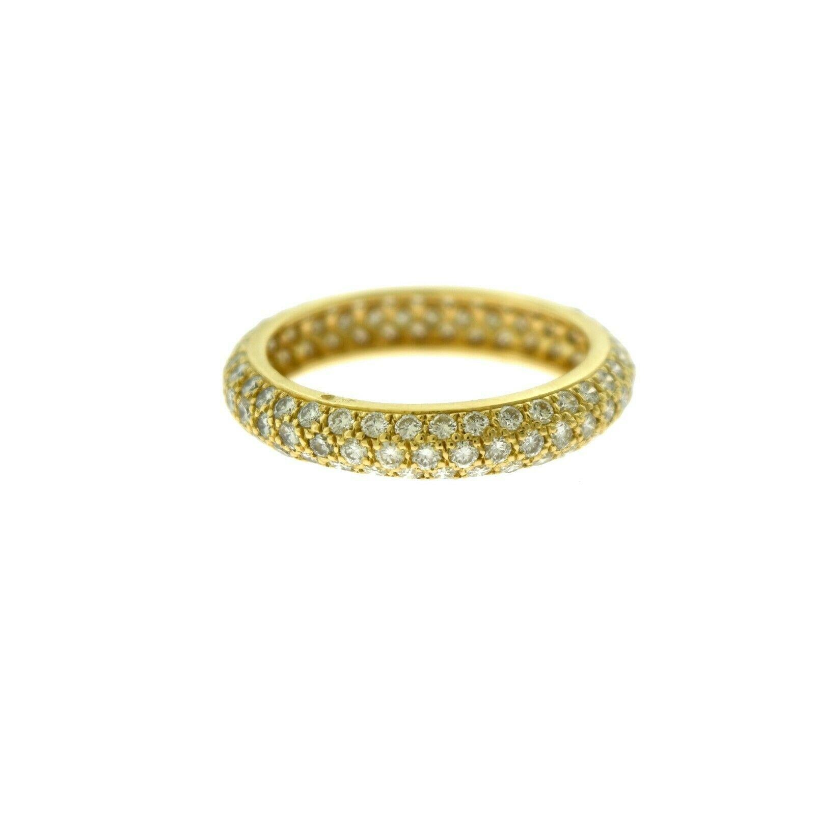 Designer: Cartier

Style: Eternity Band Ring

Metal: Yellow Gold

Metal Purity: 18k

Stones: Round Brilliant Cut Diamonds

Approximate Carat Weight: ~ 3.2 ct

Total Item Weight (grams): 3.0

Ring Size: 51 (euro) 

Includes:  24 Months Brilliance