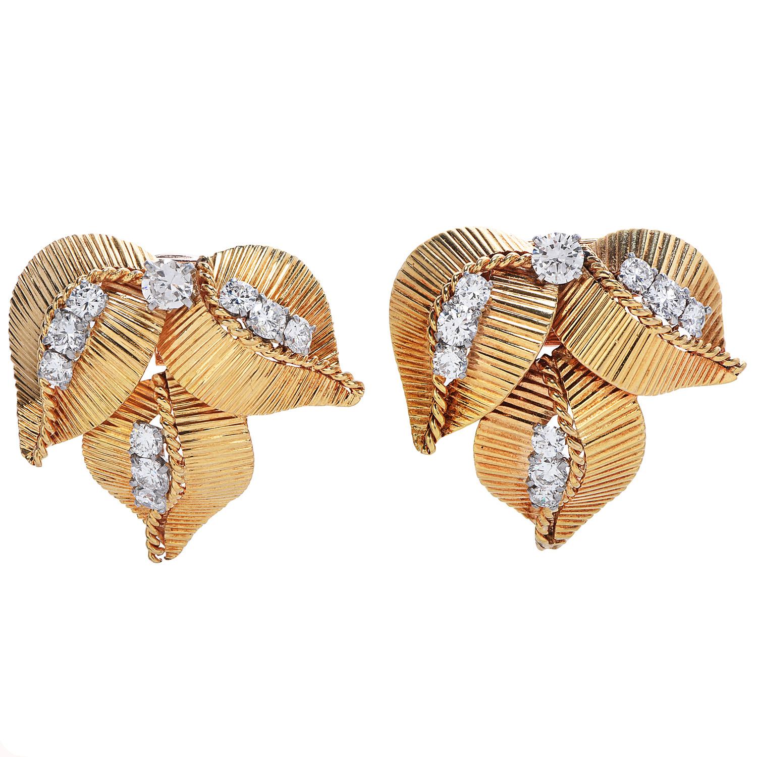 This  Exquisite 1960's French-made vintage Cartier double brooches pins set are crafted in 18k yellow gold with leaf floral-inspired with textured handmade accents,  

They composed of (20) round-cut, prong-set, Diamonds

Weighing approximately 3.70