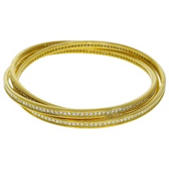 Cartier Bracelet trinité 3 rangs en or jaune 18 carats avec diamants MM