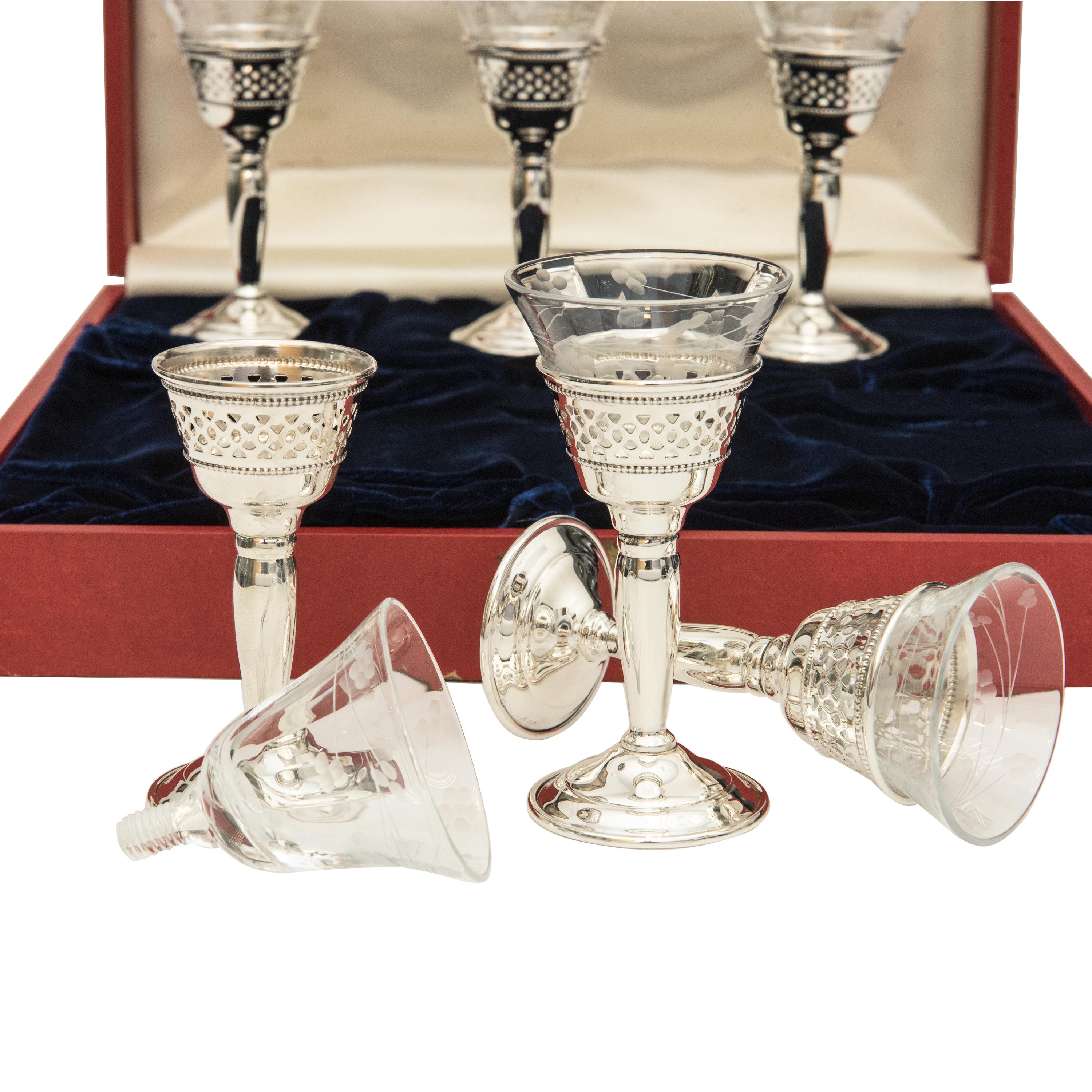 Rarely seen and never used, full set of hand cut crystal & sterling silver Cartier Cordial glasses with original box! Cartier is one of the most prestigious jewelry manufacturers in the world with a long history for making jewelry for royalty.
