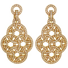 Boucles d'oreilles Cartier Galanterie Paris Nouvelle Vague en or rose et diamants. Papiers