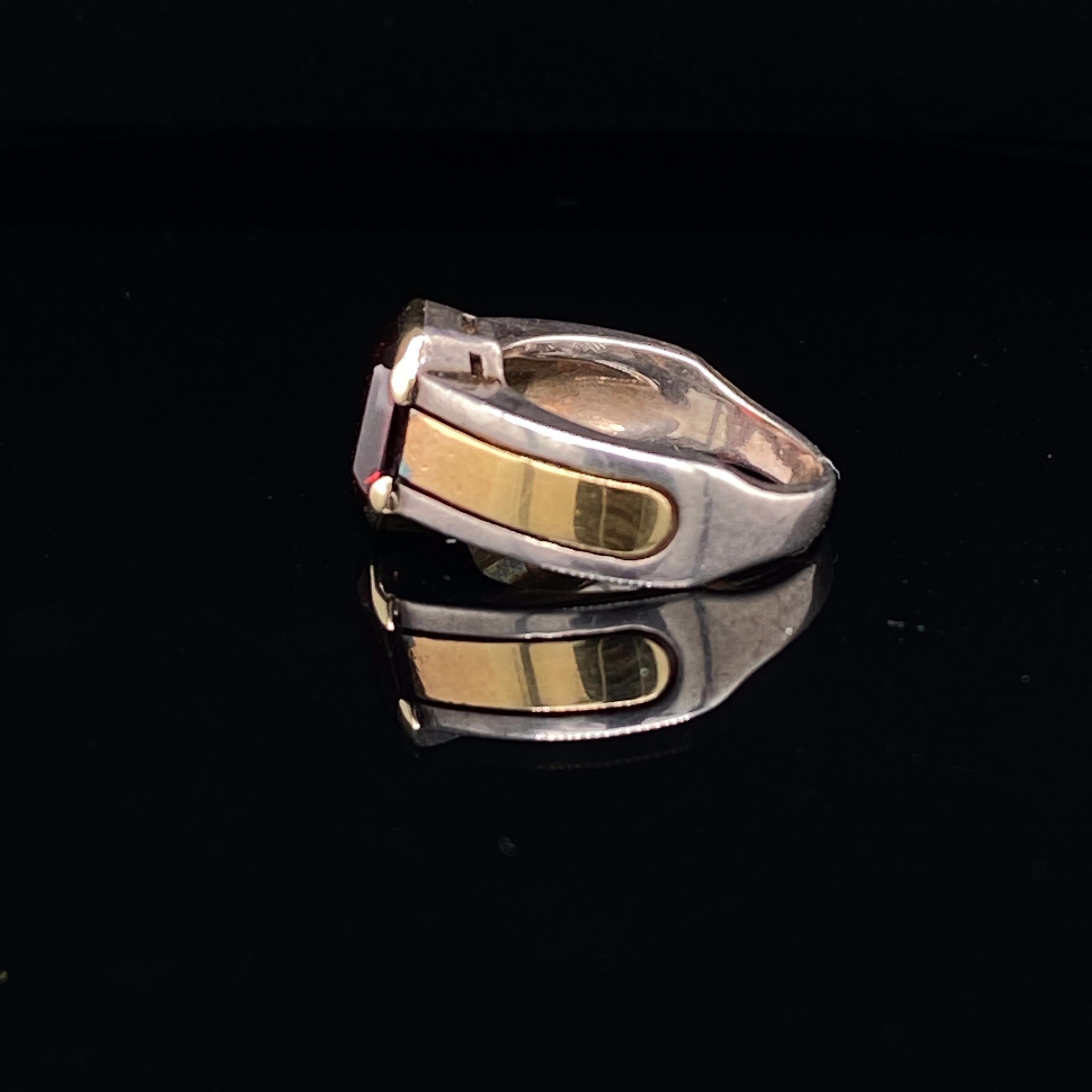 Cartier Garnet Ring in Two-Tone Silver and 18 Karat Yellow Gold, Circa 1990 In Good Condition In London, GB