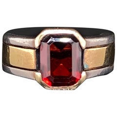 Vintage Cartier Garnet Ring in Two-Tone Silver and 18 Karat Yellow Gold, Circa 1990