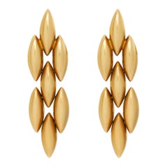 Cartier Gentaine yellow gold earrings.