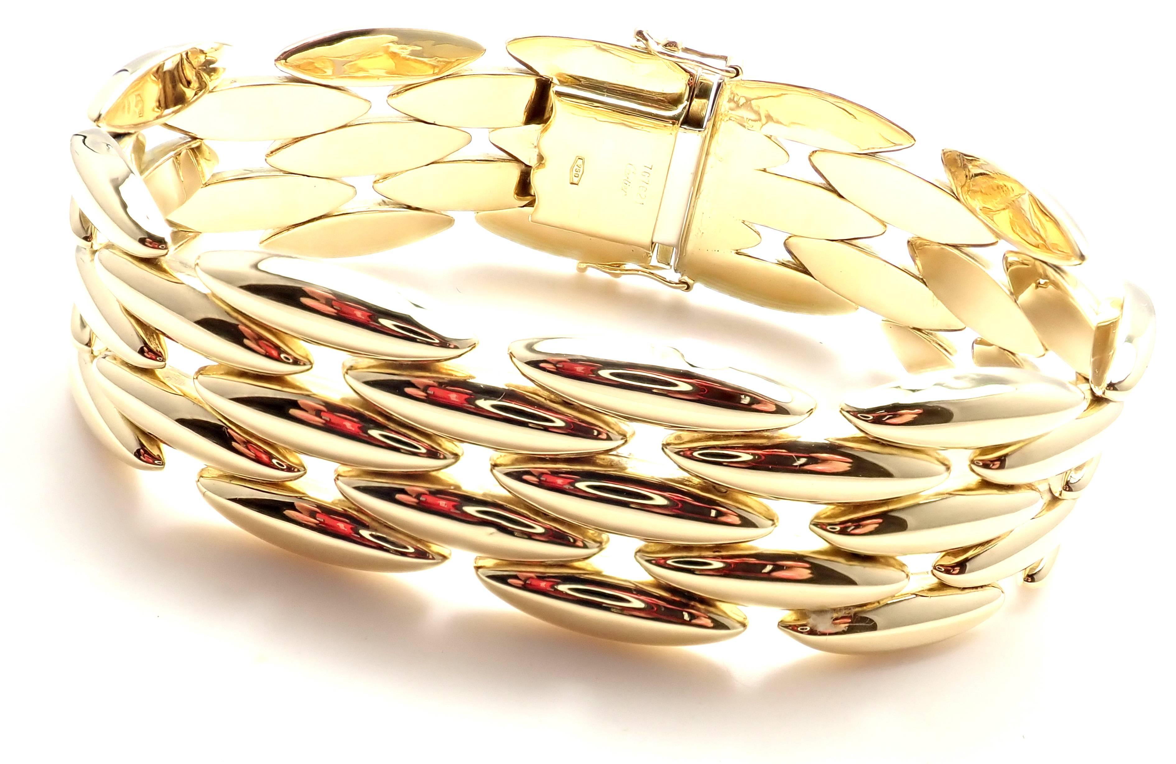 18k Yellow Gold Gentiane 5 Row Rice Link Bracelet by Cartier. 
Details: 
Length: 7.5