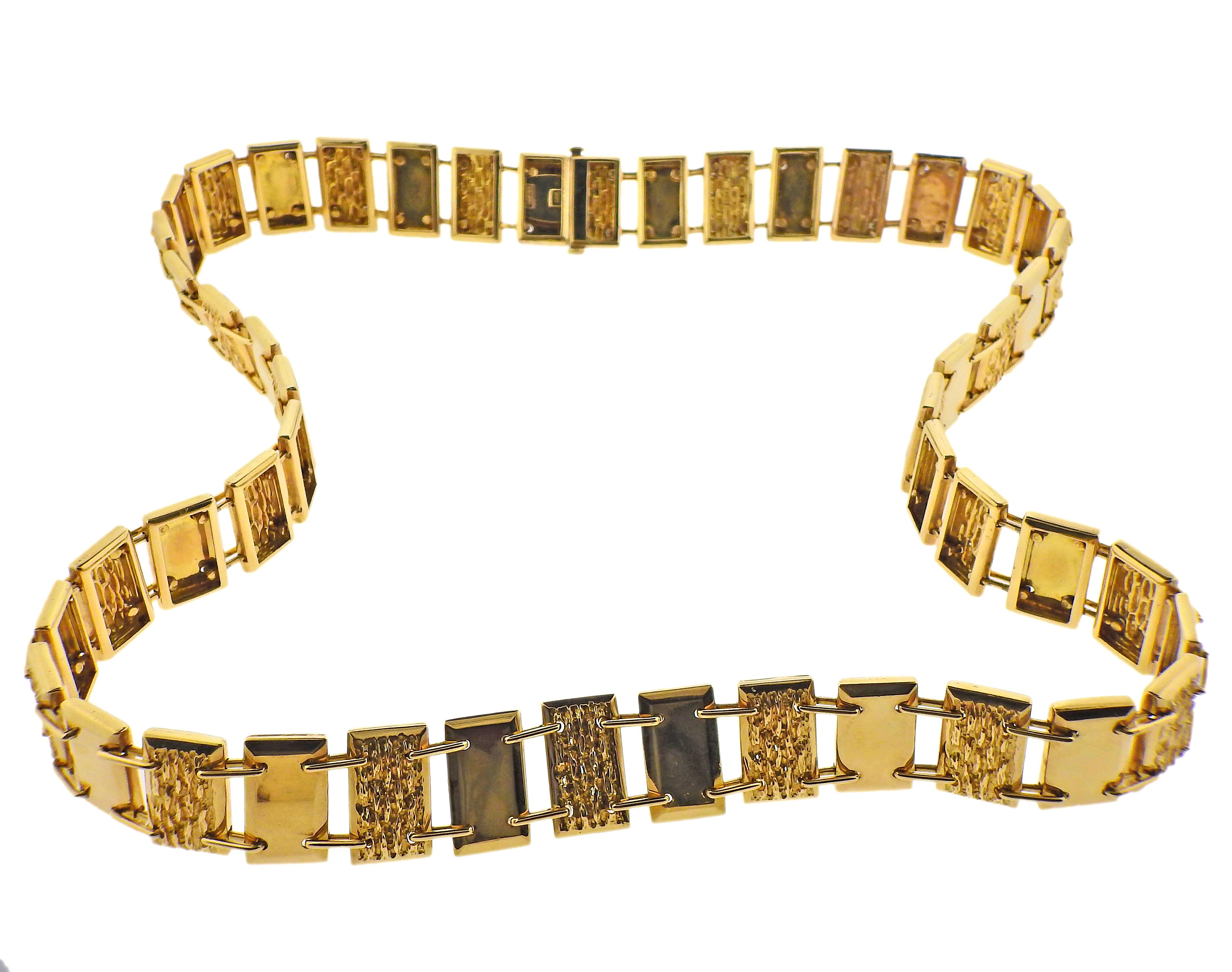 Impressive vintage Cartier 18k gold necklace (can be worn as a belt), featuring rectangular links, alternating textured and polished gold. Necklace is 31