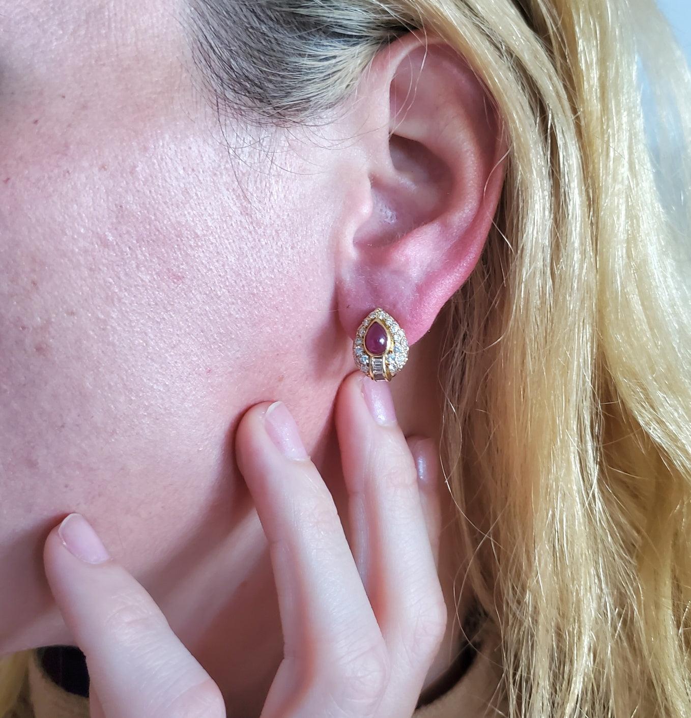 Classic cocktail earrings designed by Cartier.

This beautiful pair of clips-on earrings, were created in Paris France at the jewelry atelier of George L'Enfant for the iconic jewelry house of Cartier. This modernist gem-set earrings has been