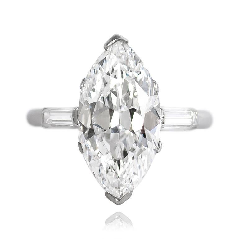 This breathtaking, antique ring from Cartier features a GIA certified, Type IIA 4.06 ct Marquise diamond of D color and VS1 clarity. Set in a handmade, platinum mounting with baguettes = 0.50 ctw (approximately), this ring is a treasure coveted by