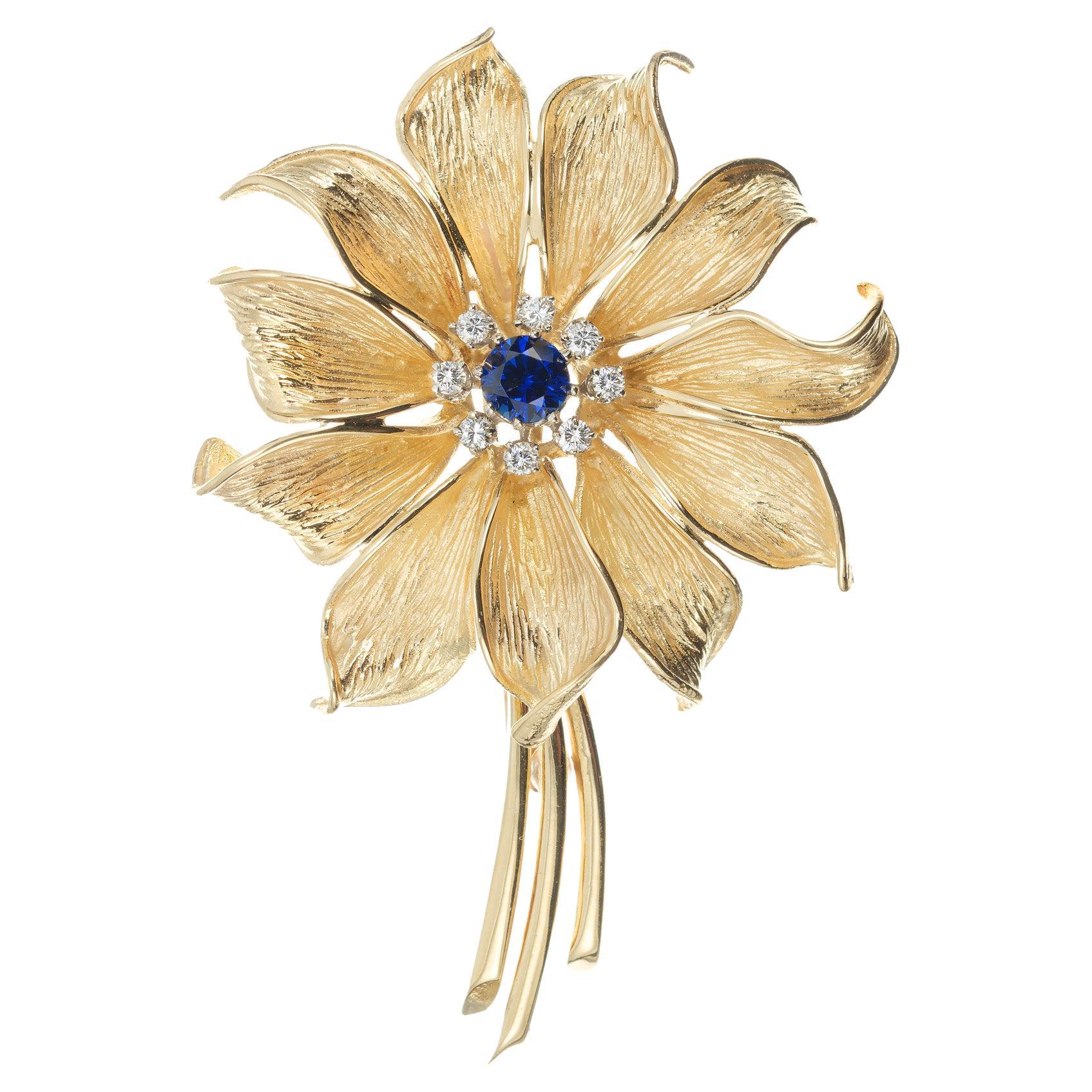 Broche fleur en or jaune certifiée GIA de Cartier avec saphir et diamant de 0,60 carat