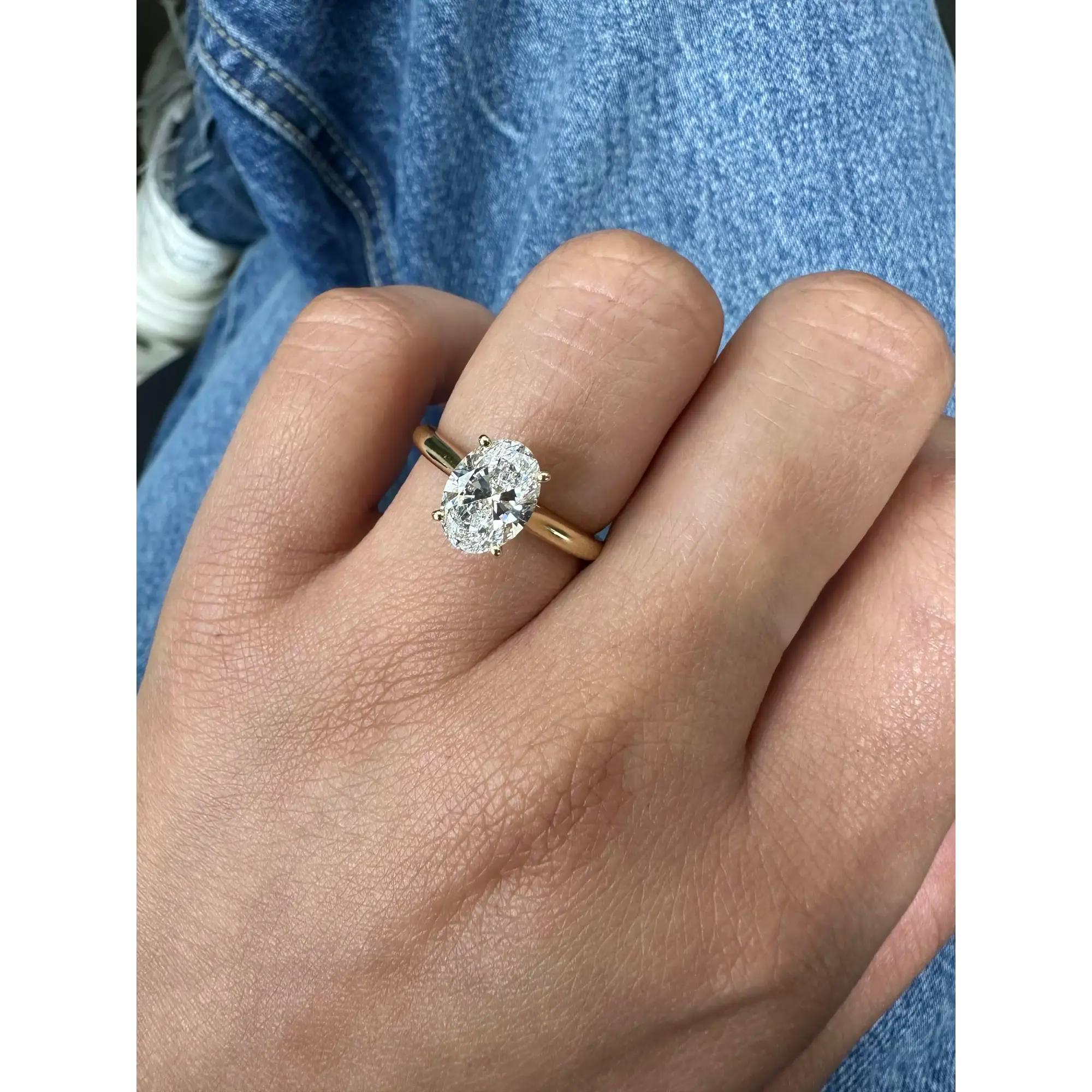 Cartier, bague de fiançailles en or jaune 18 carats avec diamant taille ovale certifié GIA, 1,80 ct. pt. SZ 53 en vente 2