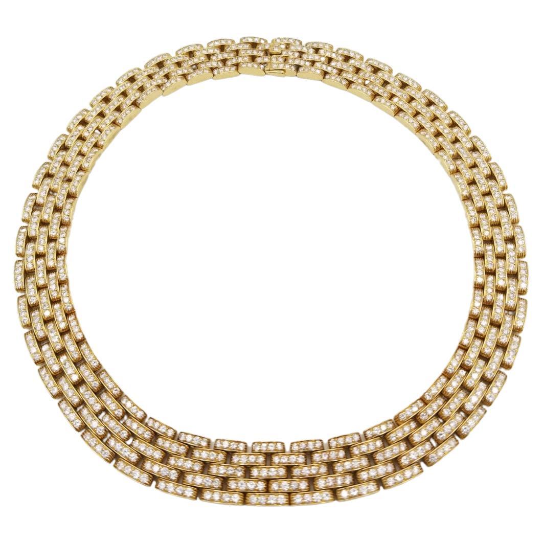 This necklace by Cartier is from the Maillon Panthère' collection and features round brilliant cut diamonds pave set in a signature Panthère' link design. 
Composed of five rows of bar links of round diamonds. with approximate weight of 15 carats