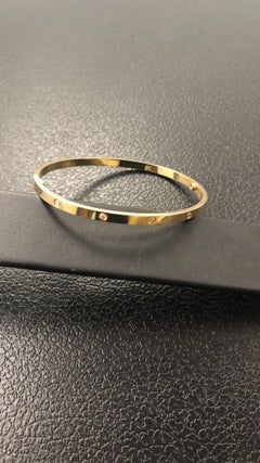 Cartier gold and diamonds collection Love bracelet