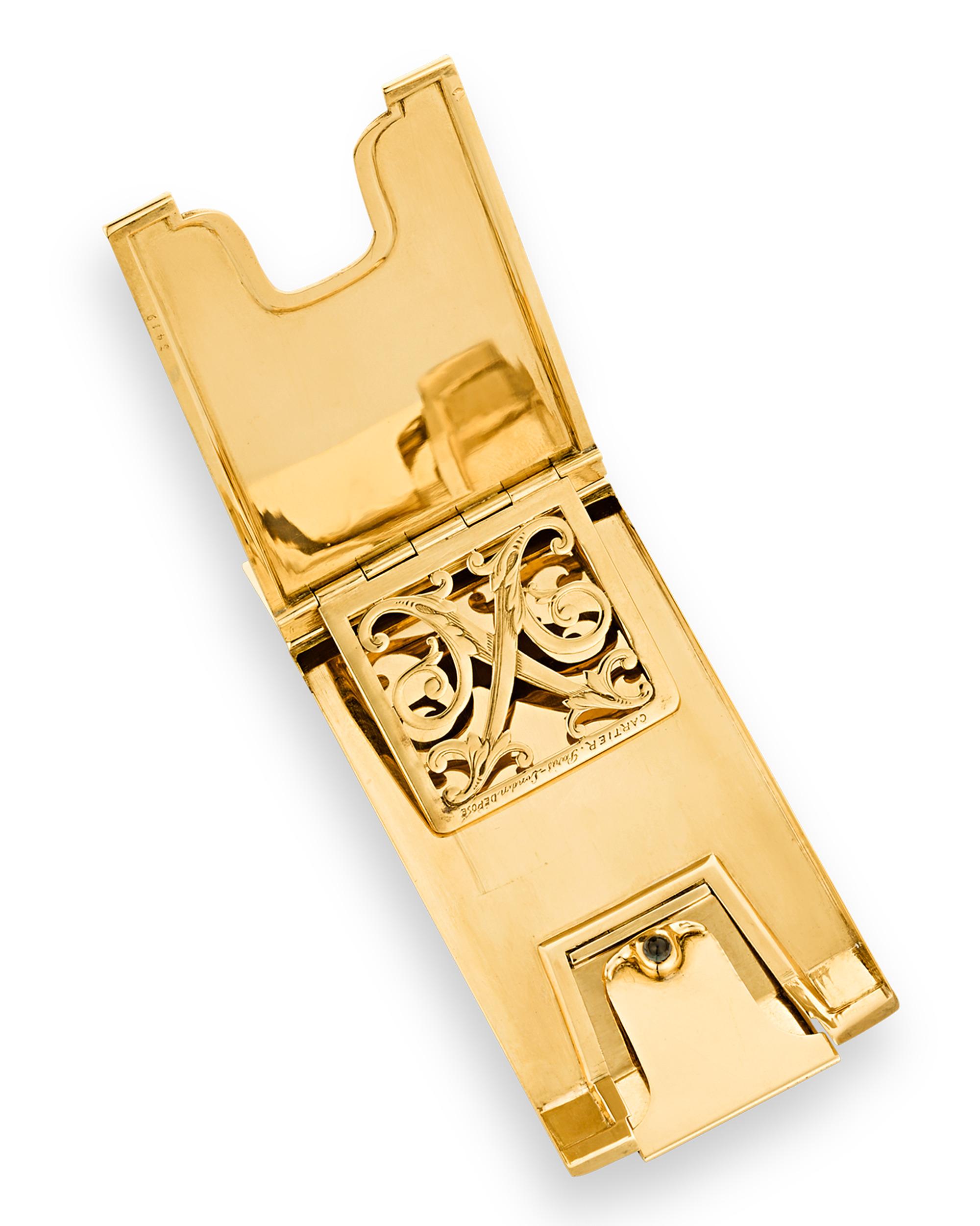 Formed entirely of 18K yellow gold polished to a high shine, this sleek case was created by the one and only Cartier. The exterior features a finely etched monogram and heraldic crown indicating this piece was made for a French Marquis. The case was