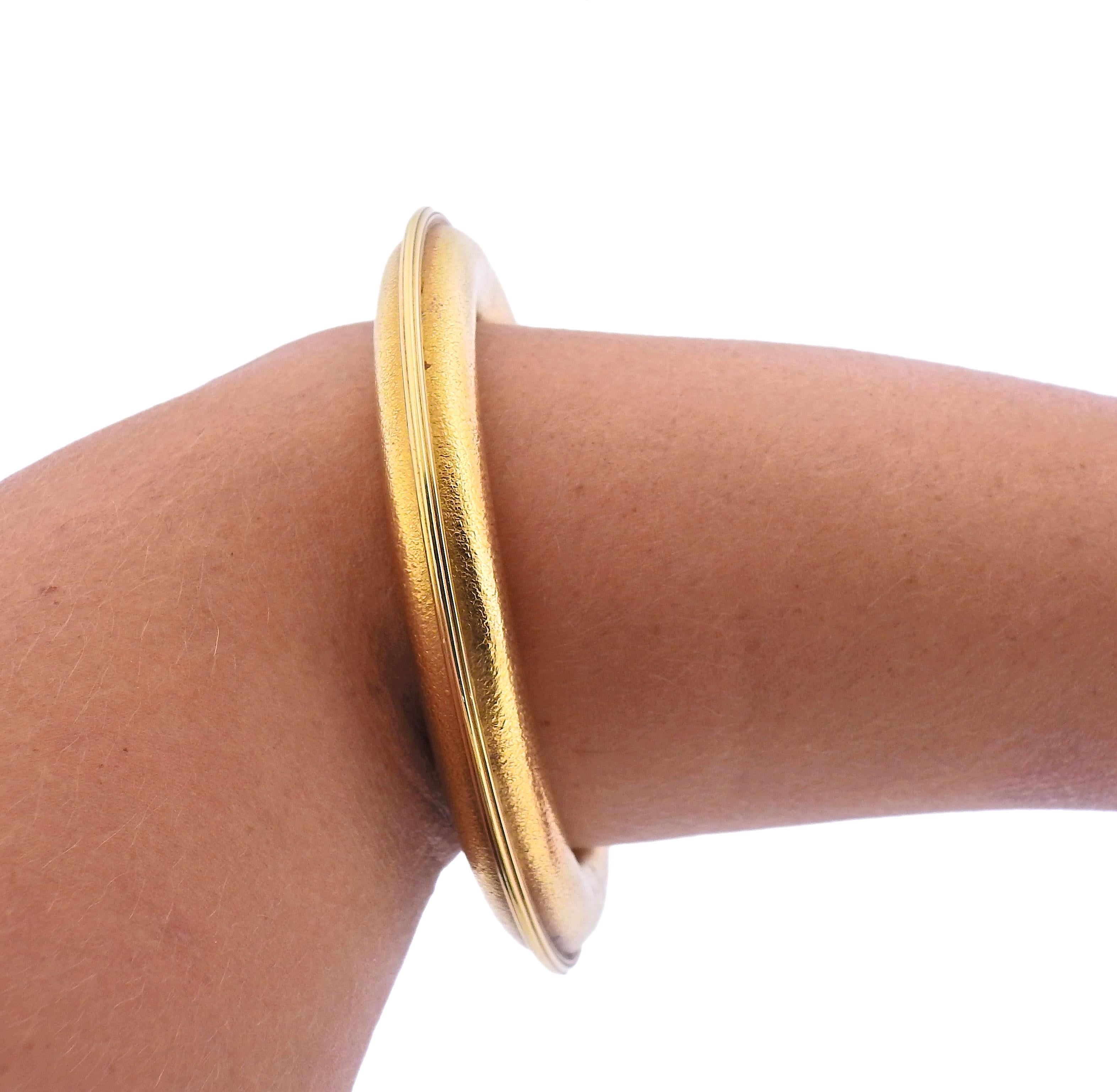 gold arm bracelet