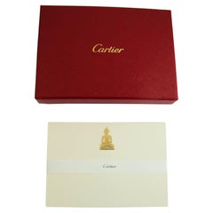 Cartier, carte d'amulettes et enveloppe Bouddha en or dans une boîte de bureau de luxe