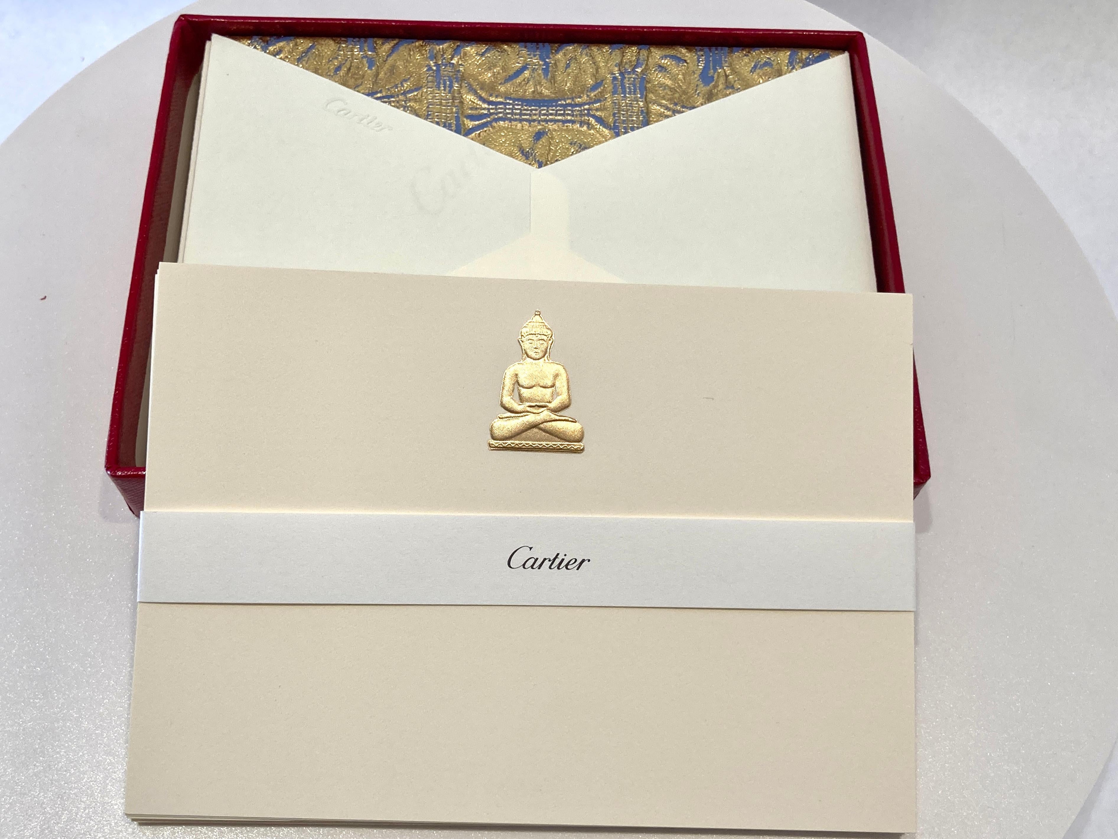 Cartier Card and Envelope Set with the Iconic Cartier Gold Seated Buddha Pendant Jewelry Design.
Authentic Luxury Cartier Stationery Card Letter and Envelope stamped with the iconic Gold Seated Buddha Pendant.
Limited edition Desk Accessory.
Emboss