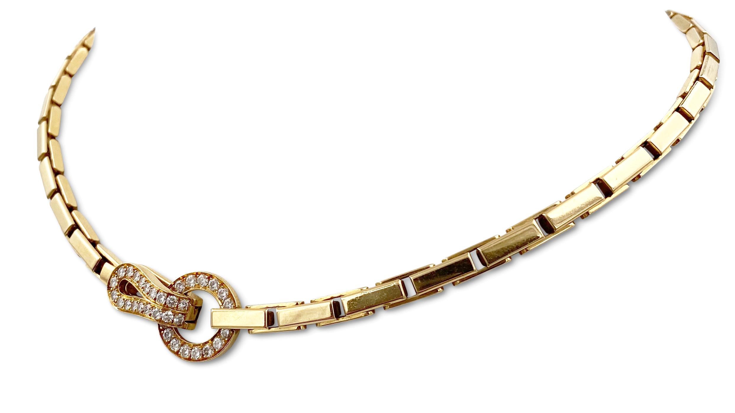 Authentic Cartier 'Agrafe' necklace crafted in 18 karat yellow gold. The hook shape clasp looks like an “Agrafe” as it means in French a clasp or hook. Clasp is set with approx. 0.96 carats of round brilliant cut diamonds (F color, VS clarity).