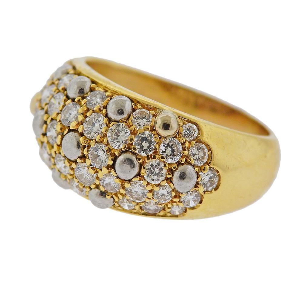 Cartier 18k gold dome ring, set with approx. 1.40ctw in diamonds. Ring size 7.25, ring top is 10mm wide. Marked: 750, Cartier (partially visible) 731162. Weight - 7.8 grams.R-03080