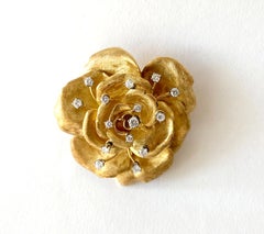Juego de broche y pendientes Cartier France 18K de oro rosa con diamantes