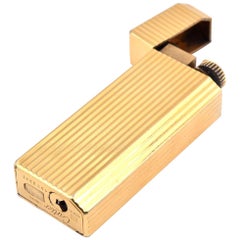 Briquet Cartier rempli d'or