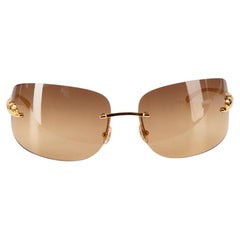 Gafas de sol rectangulares de leopardo dorado Cartier