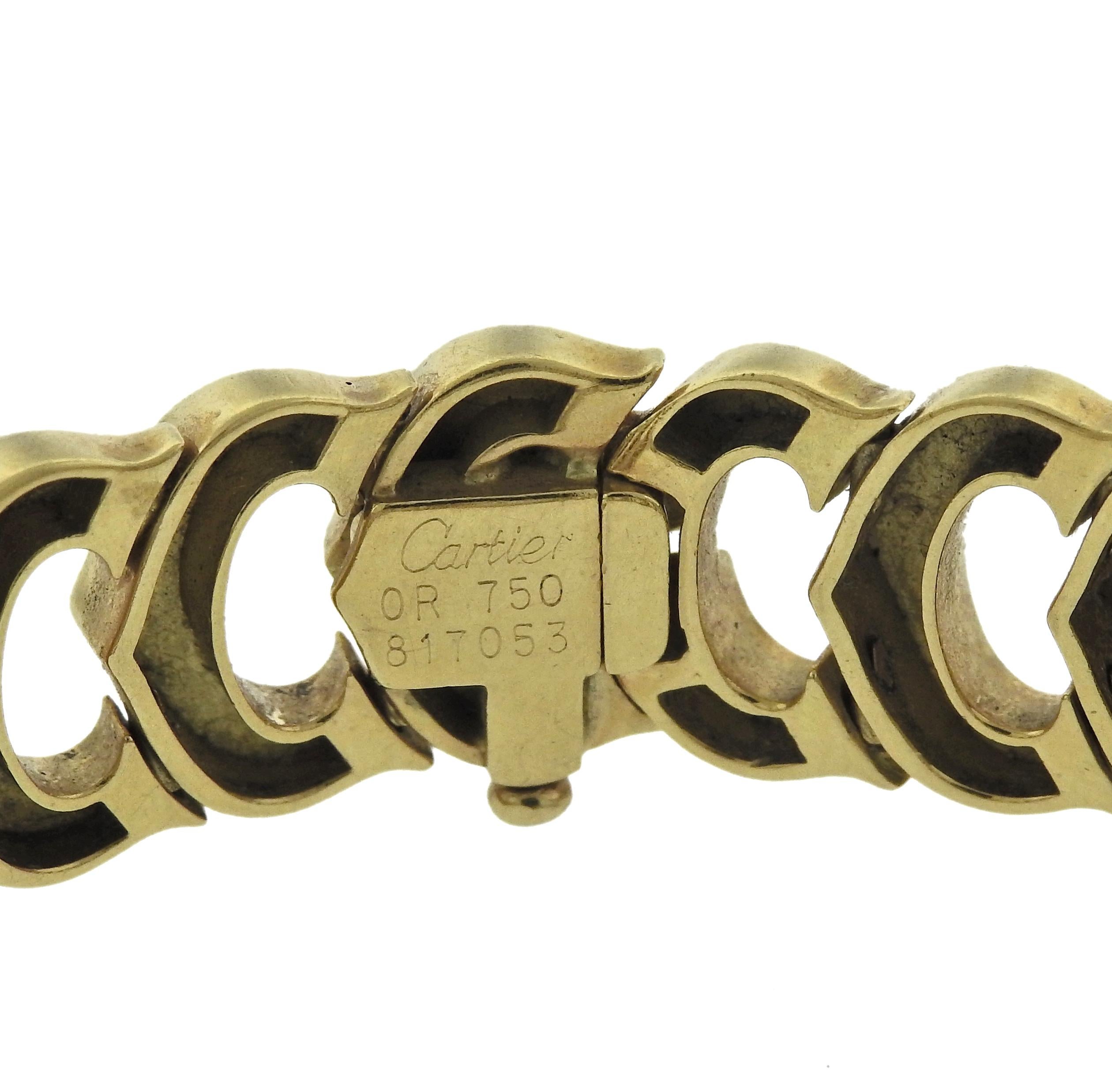 18k yellow gold C de Cartier bracelet. Bracelet is 7
