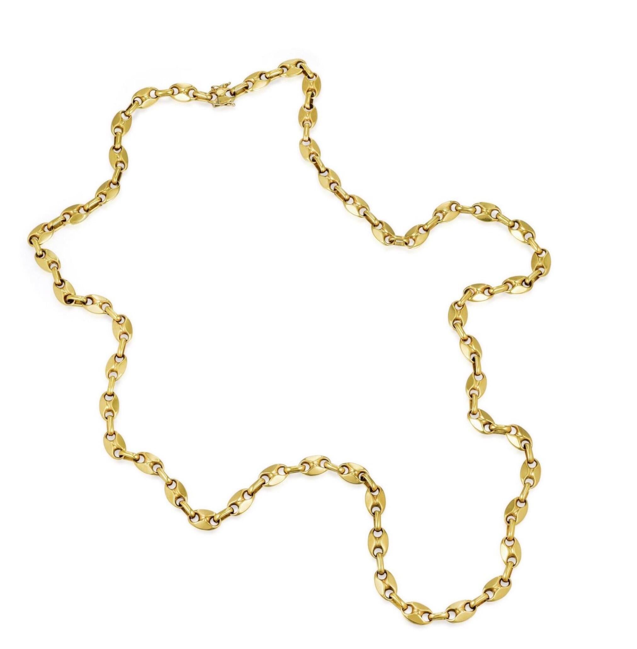 Crafted in 18K gold, featuring a series of solid links assembled with oval connecting links that permit fully flexible wear and drape; joined by a box and tongue clasp with double figure 8 wire safety clasps;

length 36 inches, 

width 1/3 inch;

