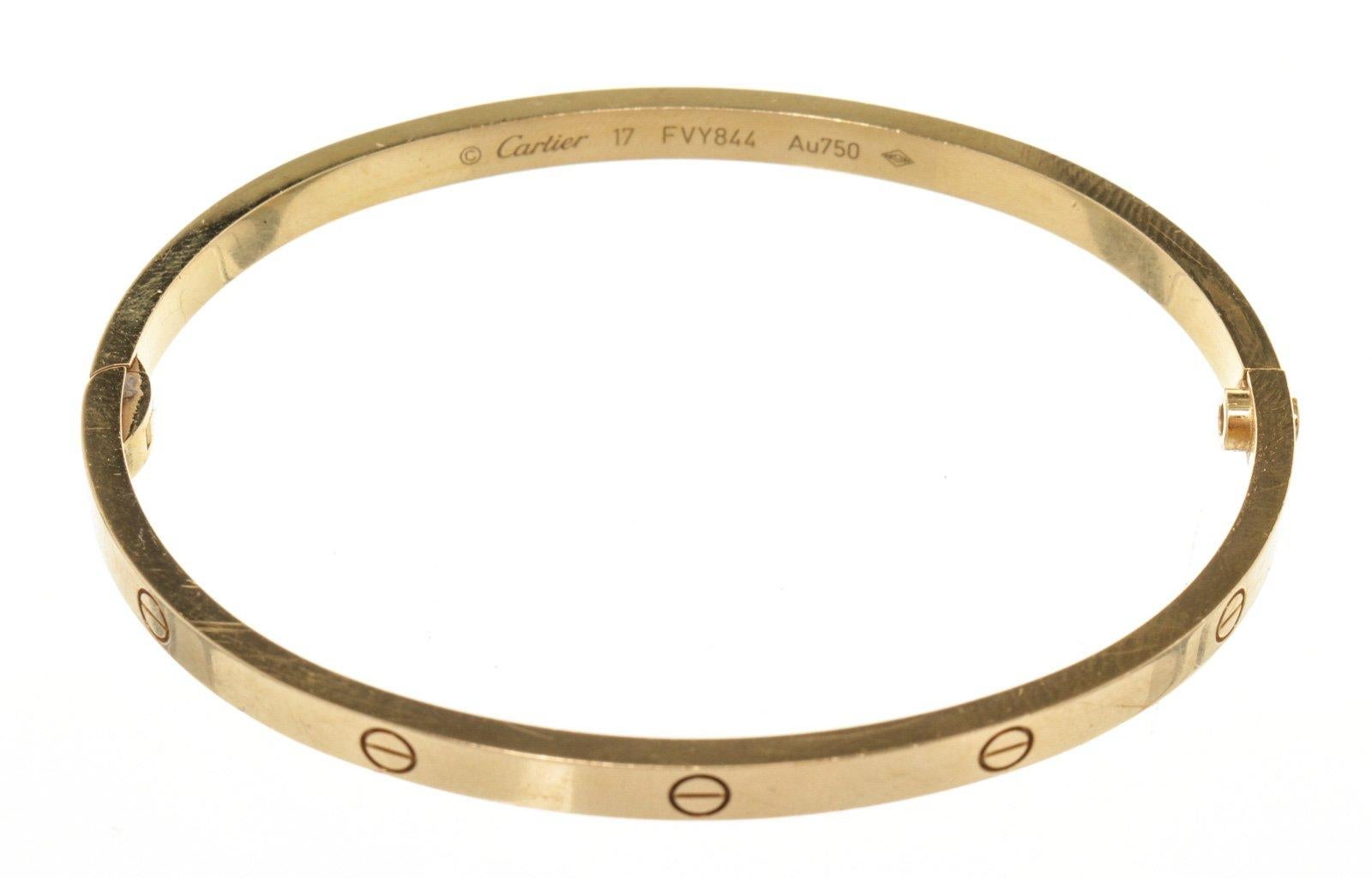 Cartier Gold Love Bracelet with gold-tone hardware. 

47110MSC