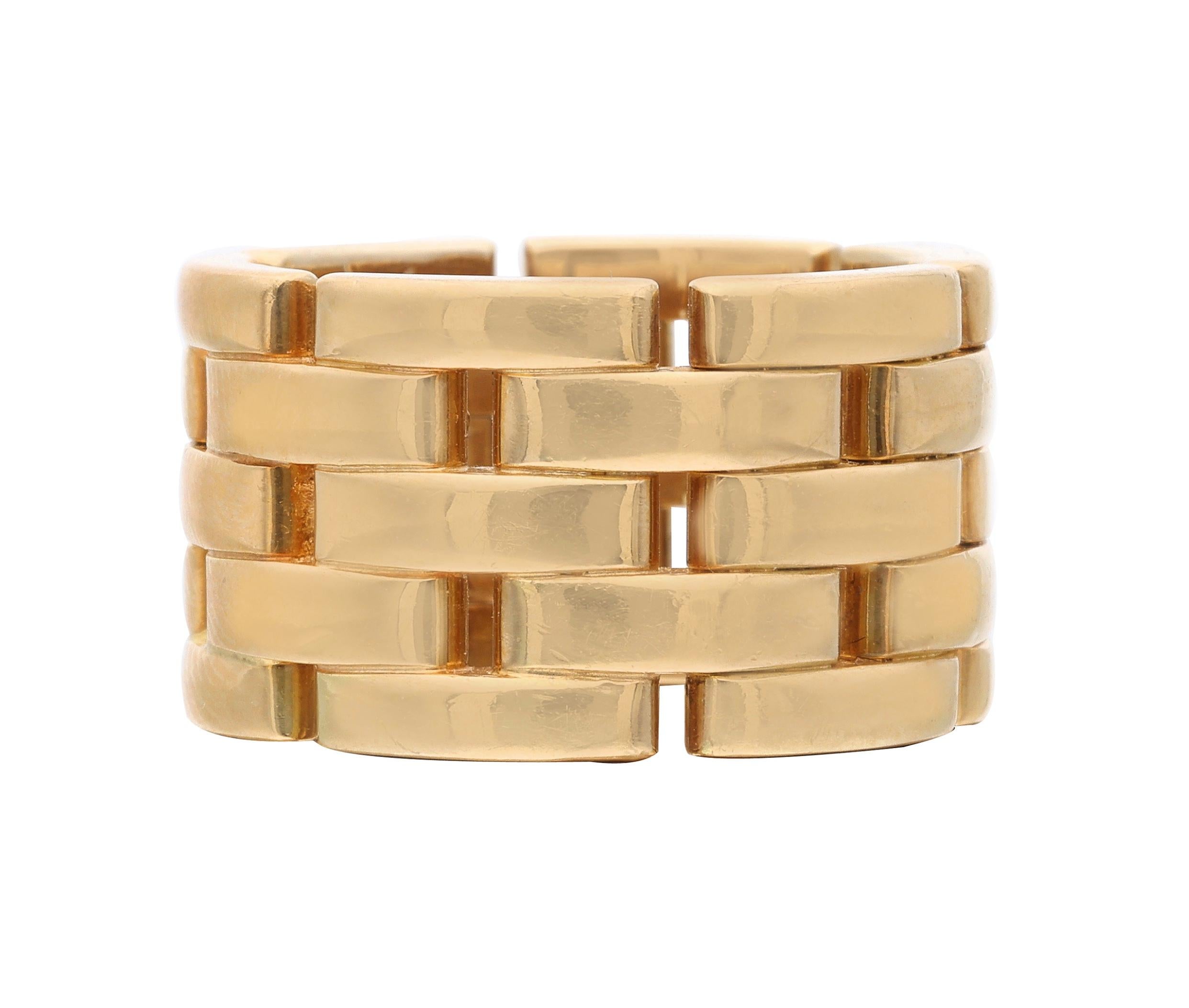 A classic Cartier signature link design.

- 18 karat yellow gold
- Signed Cartier
- Total weight 21.8 grams
- Size 7
- Width 0.5 inch

The condition report is Very Good. 

Perfect for casual settings. 