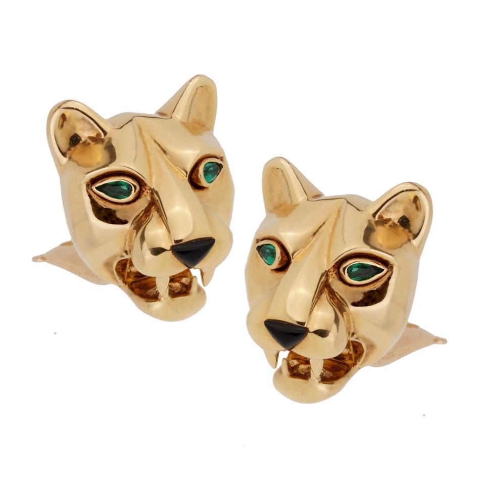 Cartier
Gold Panther Clip On Emerald Eyes Onyx Nose Drop Earrings
Beautiful Cartier Panther Clip On Drop Earrings.

Set with emerald eyes and onyx nose.
Length: 2in approx
Clip On closure.
Comes with original box and Cartier certificate.
Impeccable