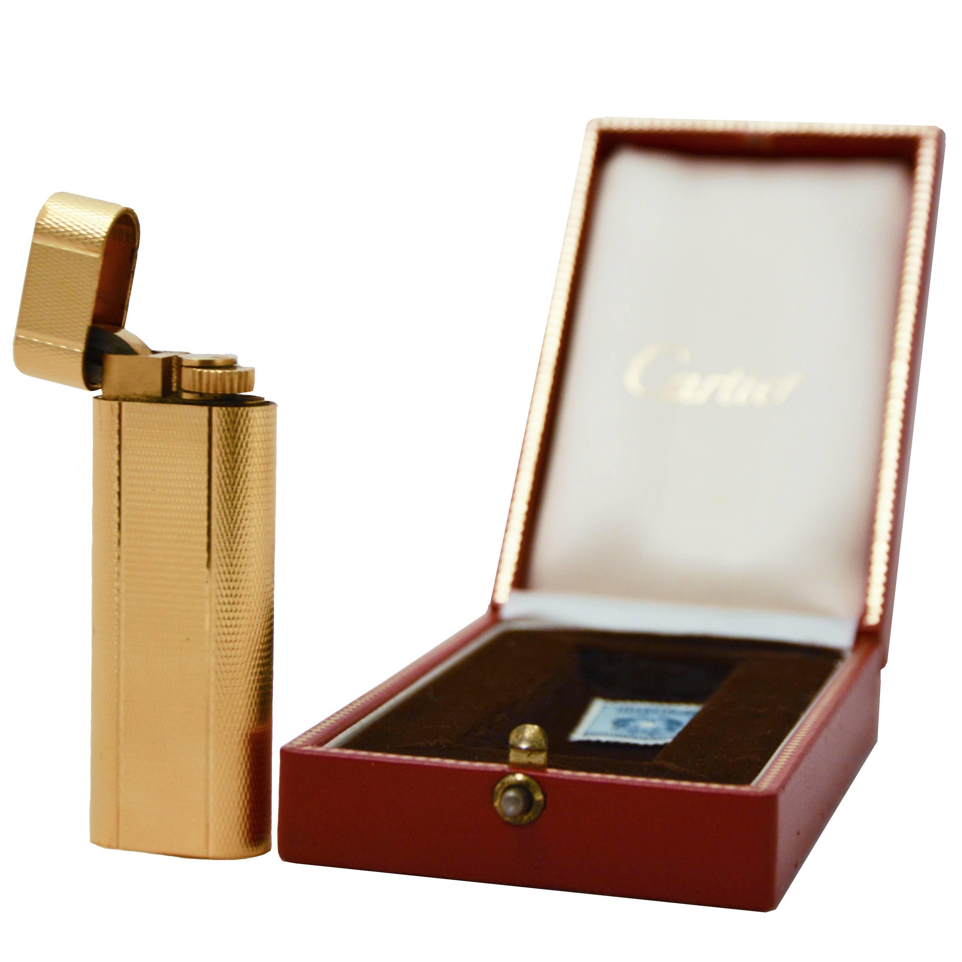 Cartier Briquet plaqué or, années 1990 en vente