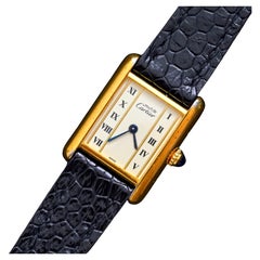Must de Cartier chapado en oro Vermeil 5057001 Índices romanos Cuarzo, años 80