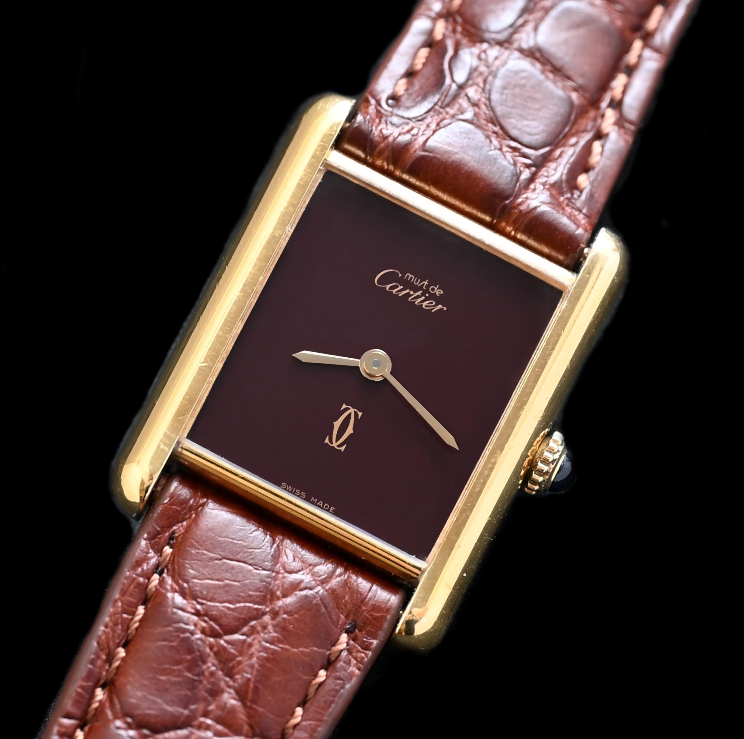 Brand: Cartier
Model: Tank Must de
Year: 1981’s
Serial Number: 61xxxxx
Reference: C03941

Case: Show sign of wear with the Gold Plated Case in size 23 x 30mm without crown; Cartier serial numbers engraved on the case back

Dial: Aged Condition