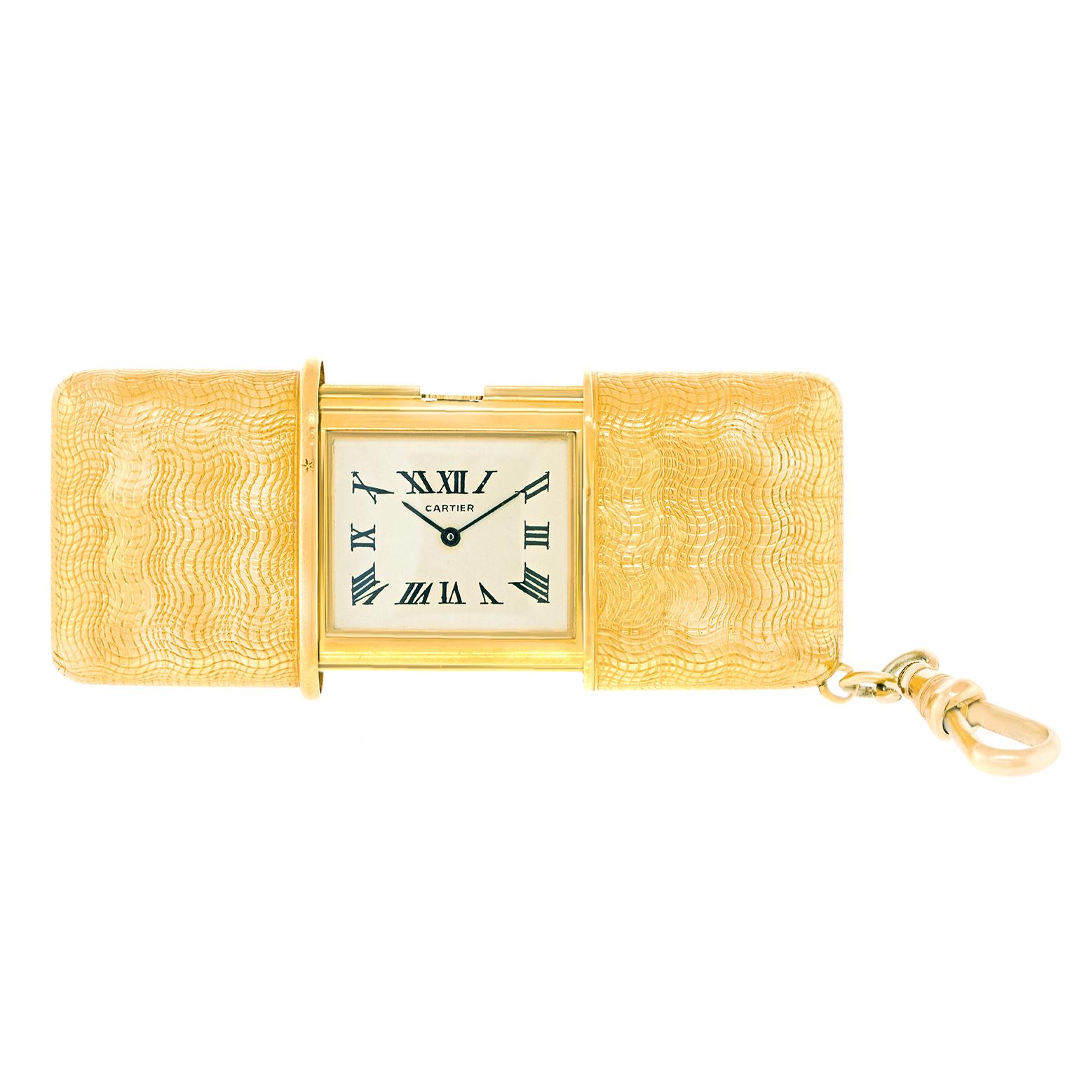 Circa  1950s, 18k, by Cartier, France.  A women's purse can hold many secrets, but who expects a solid gold Cartier time piece! An ultimate expression of luxury, this one winds itself when opening and closing the cover. Recently serviced, it is in