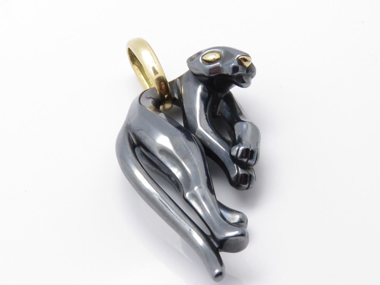 Large Panther pendant by CARTIER , set in silver and 18k yellow gold.
Signed Cartier and numbered with French Assay.
Measurements: Height= 2.17 In ( 55 mm )       Width= 1.18 In ( 30mm )           Weight= 28 Grams