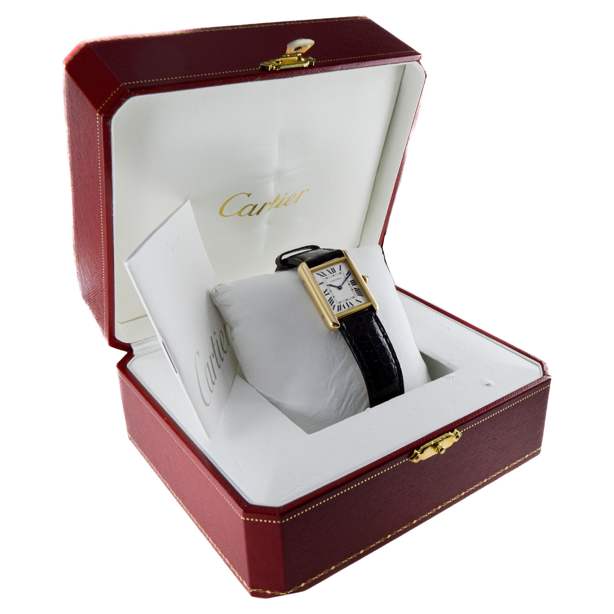 FACTORY / HOUSE: Cartier 
STYLE / REFERENCE: Art Deco / Reference 2743 / Tank Solo
METAL / MATERIAL: 18Kt. with Steel Back
CIRCA / YEAR: 2000's
DIMENSIONS / SIZE: Length 31mm 
