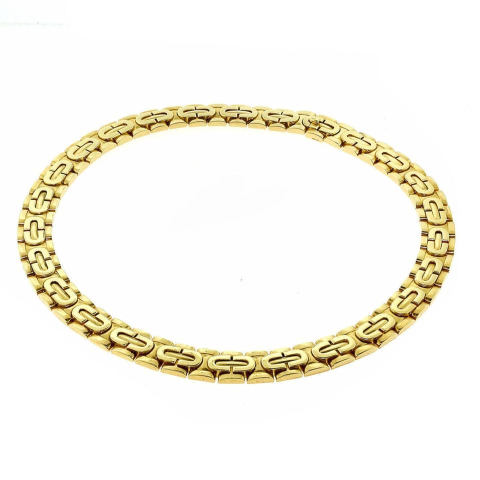 Cartier
Gold Vintage Art Deco 18k Yellow Chain Link Choker Circa 1996 Necklace

Designer: Cartier
Style: Choker Link Necklace
Metal: Yellow Gold
Metal Purity: 18k
Weight: 145 grams
Cartier Box included.