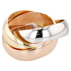 Cartier Gold, White Gold, and Rose Gold Trinity Ring Web Store Description