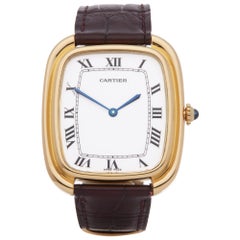 Montre homme Cartier Gondole Jumbo Paris 81720400 en or jaune